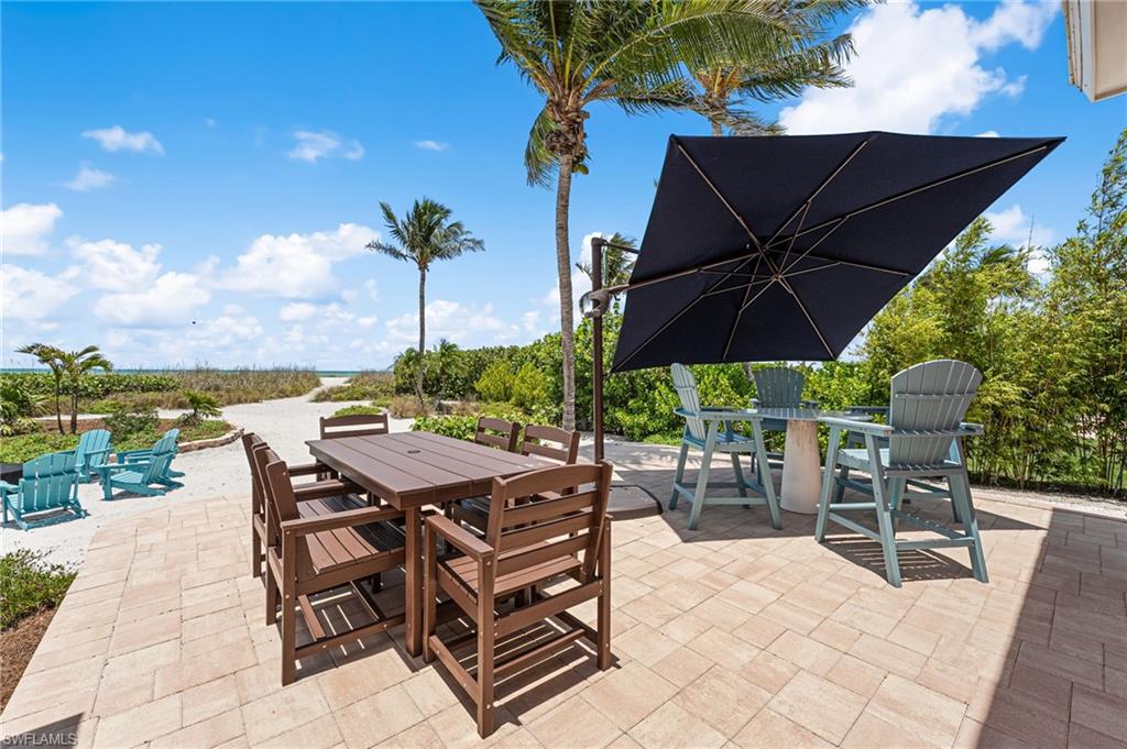 Expansive lanai perfect for outdoor dining and relaxation.