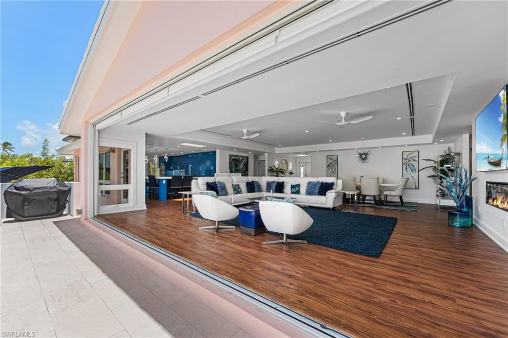 Seamless indoor-outdoor living with panoramic beach views.
