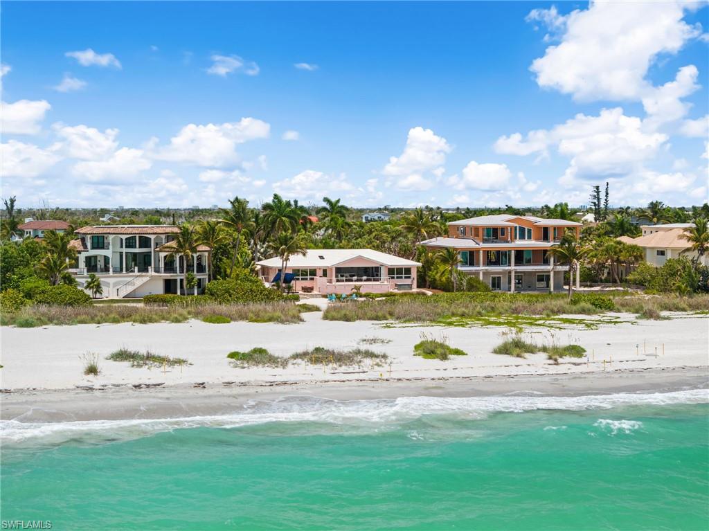 Steps from the sand and the sparkling waters of the Gulf.