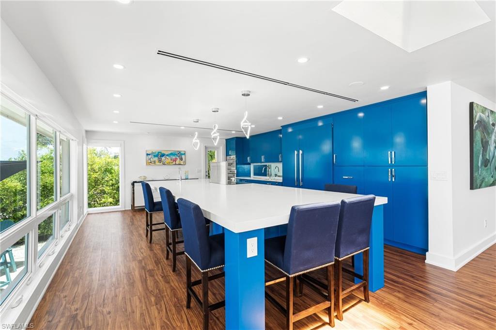 Quartz countertops and designer finishes throughout.