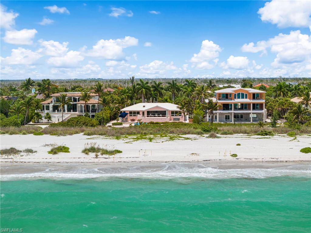 Steps from the sand and the sparkling waters of the Gulf.
