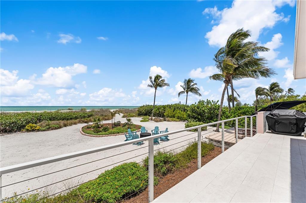 Seamless indoor-outdoor living with panoramic beach views.