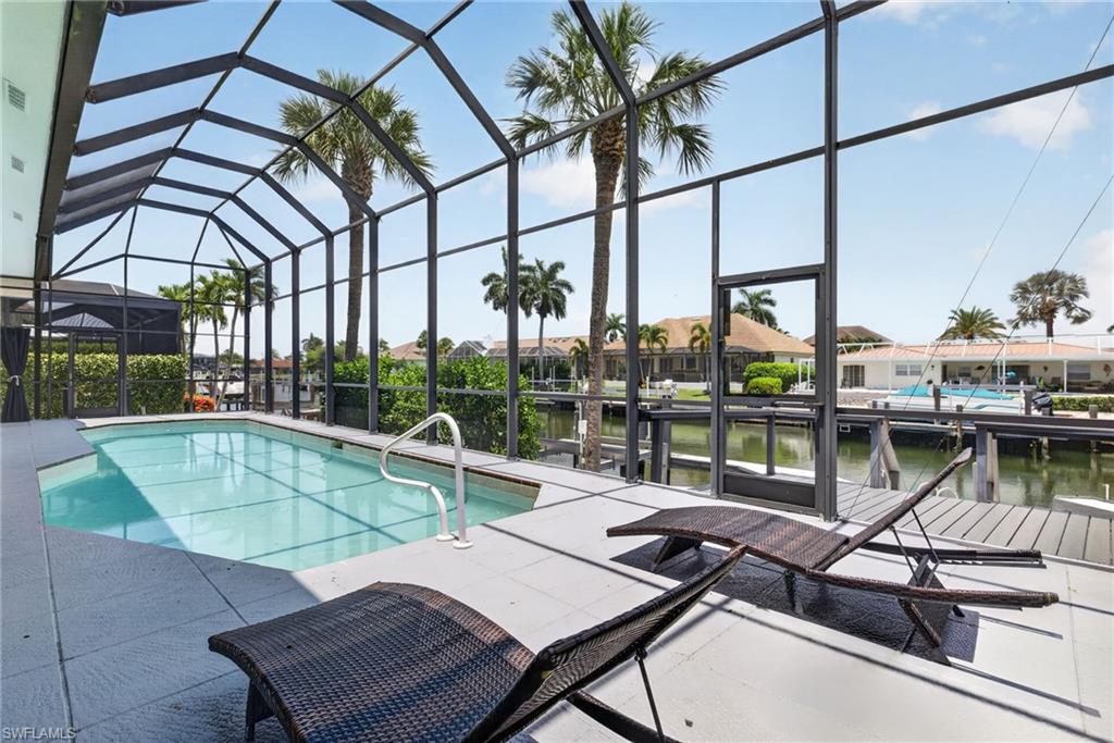 Large pool with Screened lanai