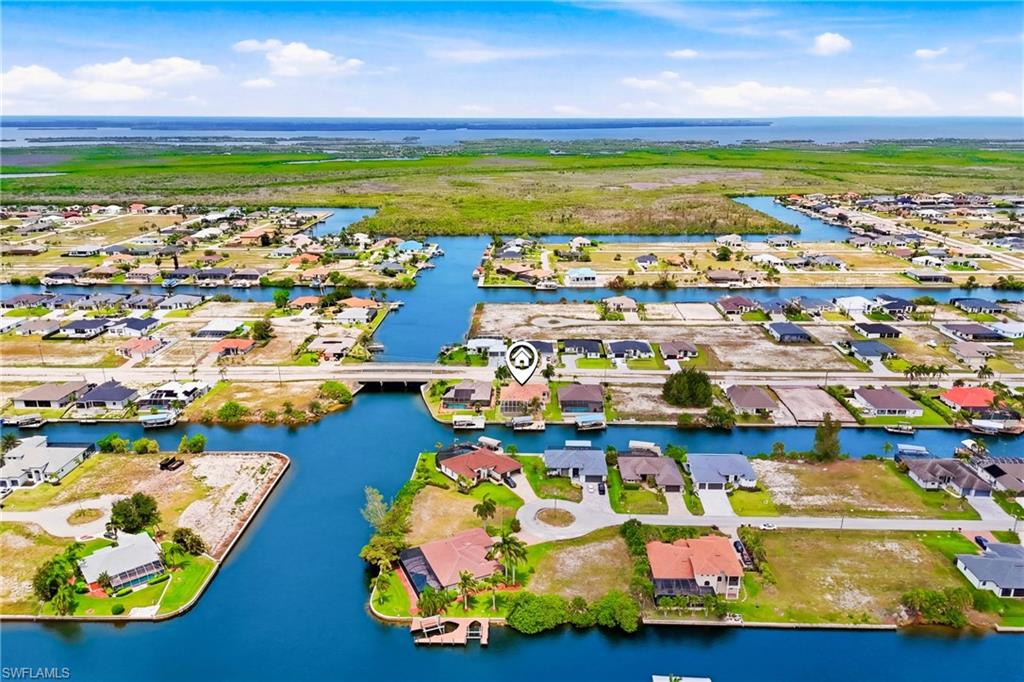 Aerial perspective showcasing a residential area with extensive canal waterways