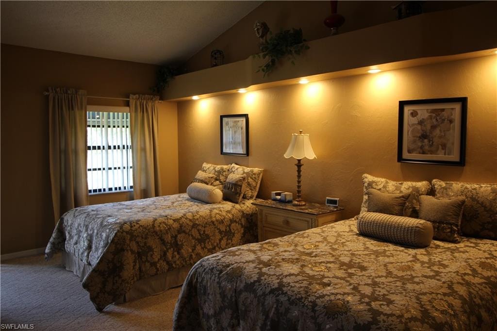 master bedroom with cathedral ceiling