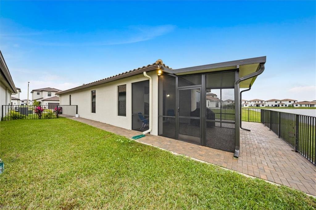 Fenced patio with w/extended pavers