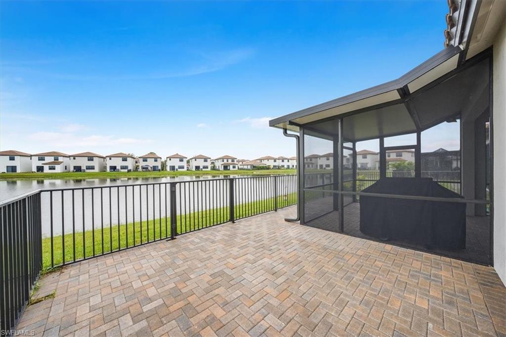 Fenced patio with w/extended pavers