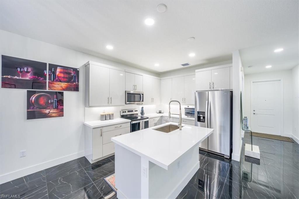 Kitchen & Foyer Entry (Right)