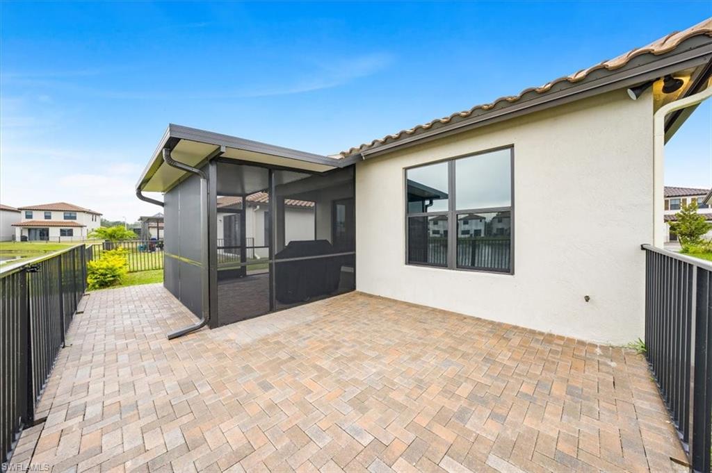 Fenced patio with w/extended pavers