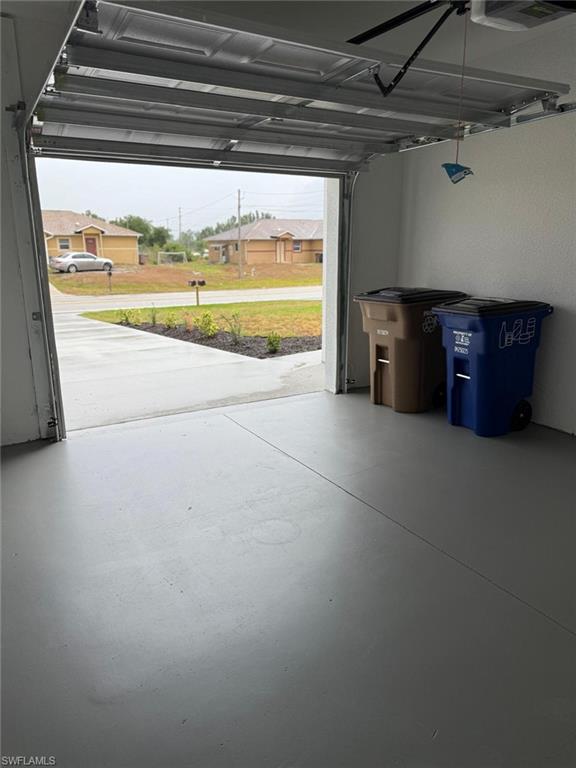 Garage featuring ceiling fan