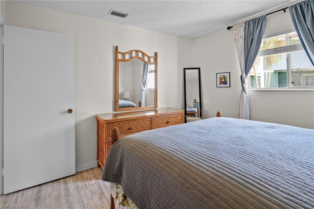Main Bedroom. Beautiful, updated flooring.
