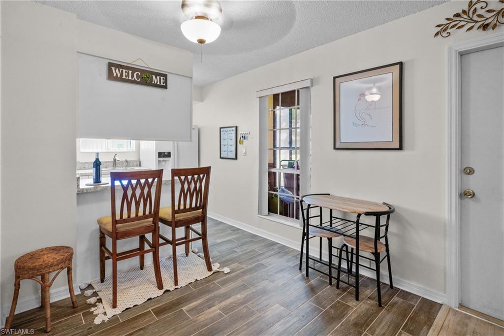 Upgraded/updated tile flooring. Breakfast bar. Kitchen/Dining area large window for lots of natural light.