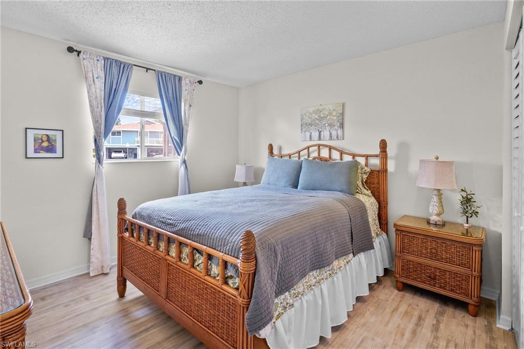 Main Bedroom. Beautiful, updated flooring.
