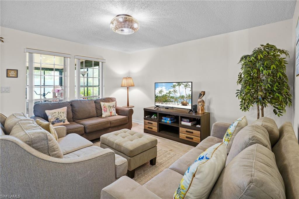 Fully Turn-key (everything included). Gorgeous upgraded, tile flooring.Just bring your bags and head for the pool. Large front windows for lots of natural light.