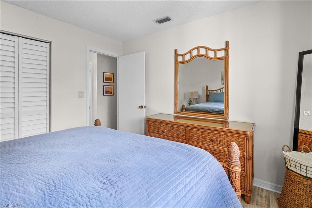 Main Bedroom. Beautiful, updated flooring.