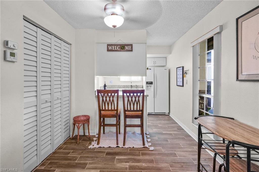 Upgraded/updated tile flooring. Breakfast bar. Kitchen/Dining area large window for lots of natural light.