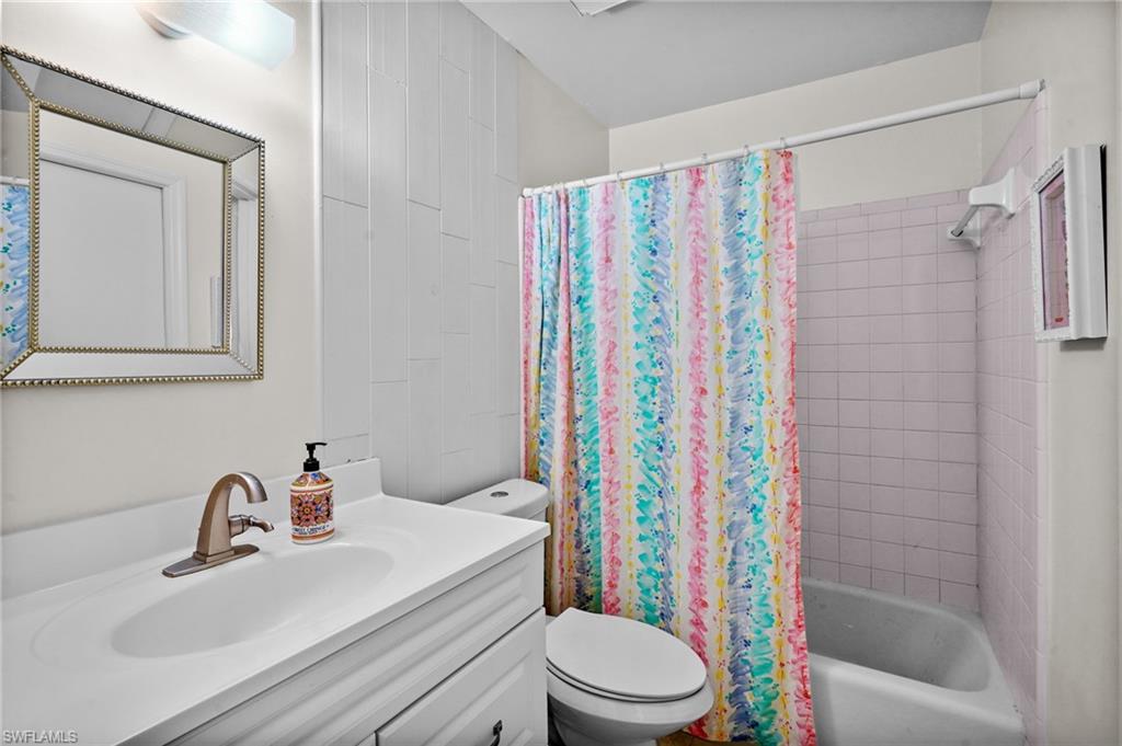 One shared bathroom with tub/shower combo.