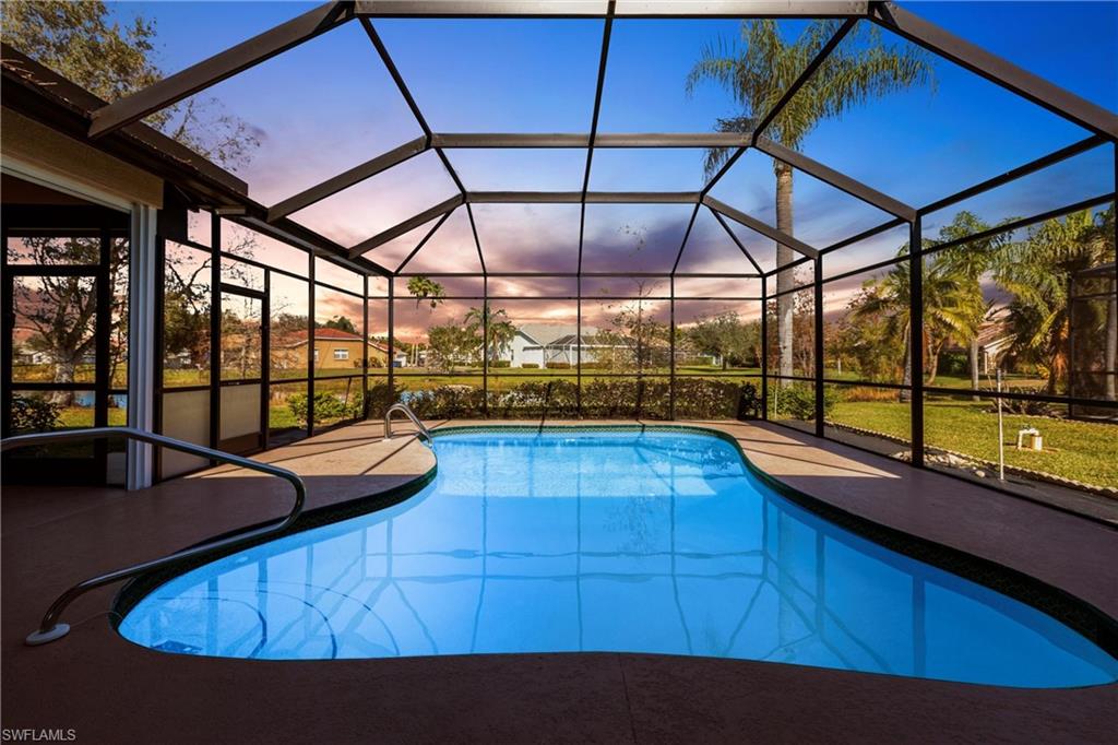 Lakefront at Sunset on your private pool on the freshly painted, screened lanai