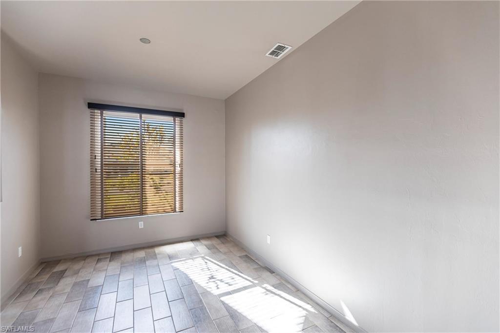 Imported Italian Ceramic tile feature in this elegant entertainment space.