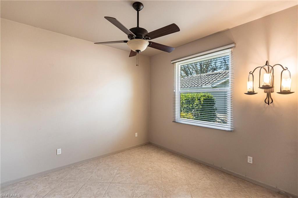 Custom tiles, custom built-in closet and hurricane rated window, lights and beautiful, lighted ceiling fan, too!