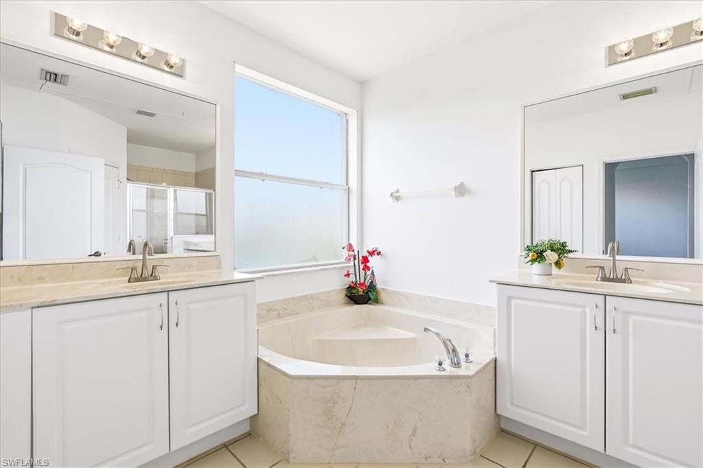 Separate sinks, soaking tub