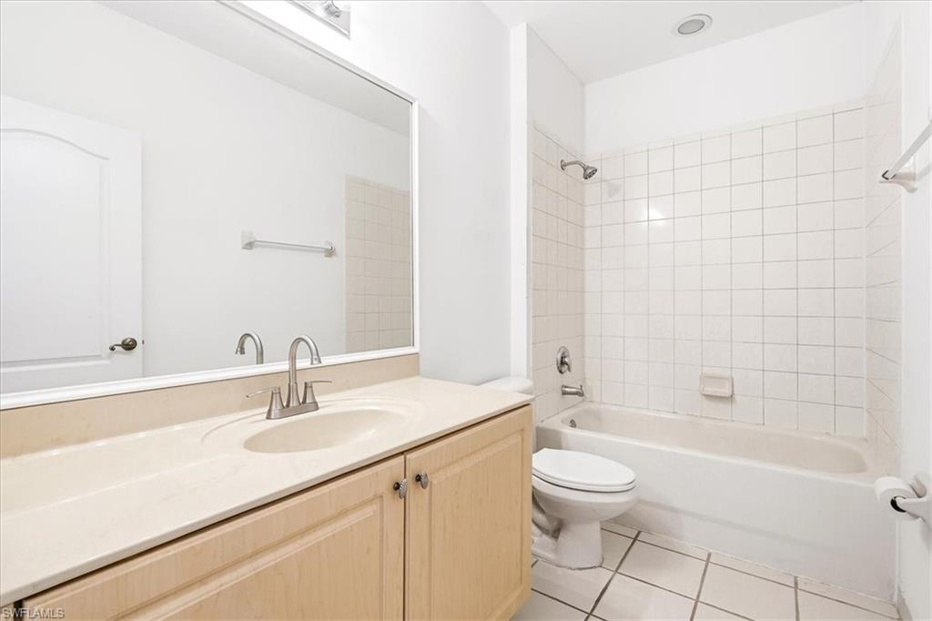 Upstairs bathroom with tub and shower combo