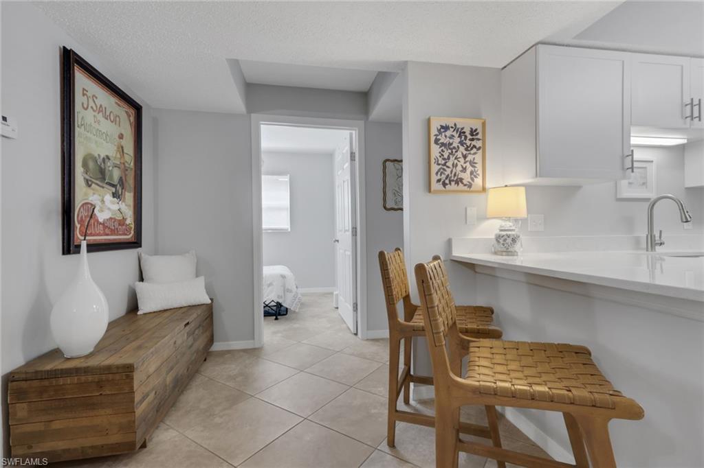 Doorway leads to the den while 2nd bathroom and 2nd guest bedroom are to the right