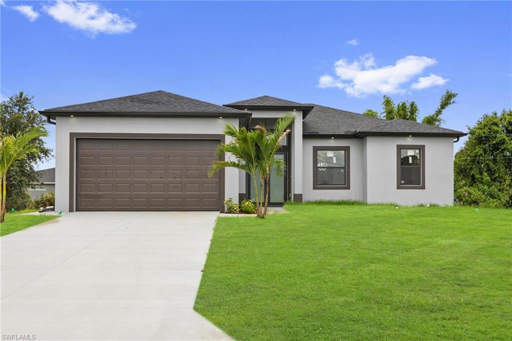 Contemporary single-story exterior featuring a light gray stucco finish, dark framed windows, and a dark asphalt shingle roof