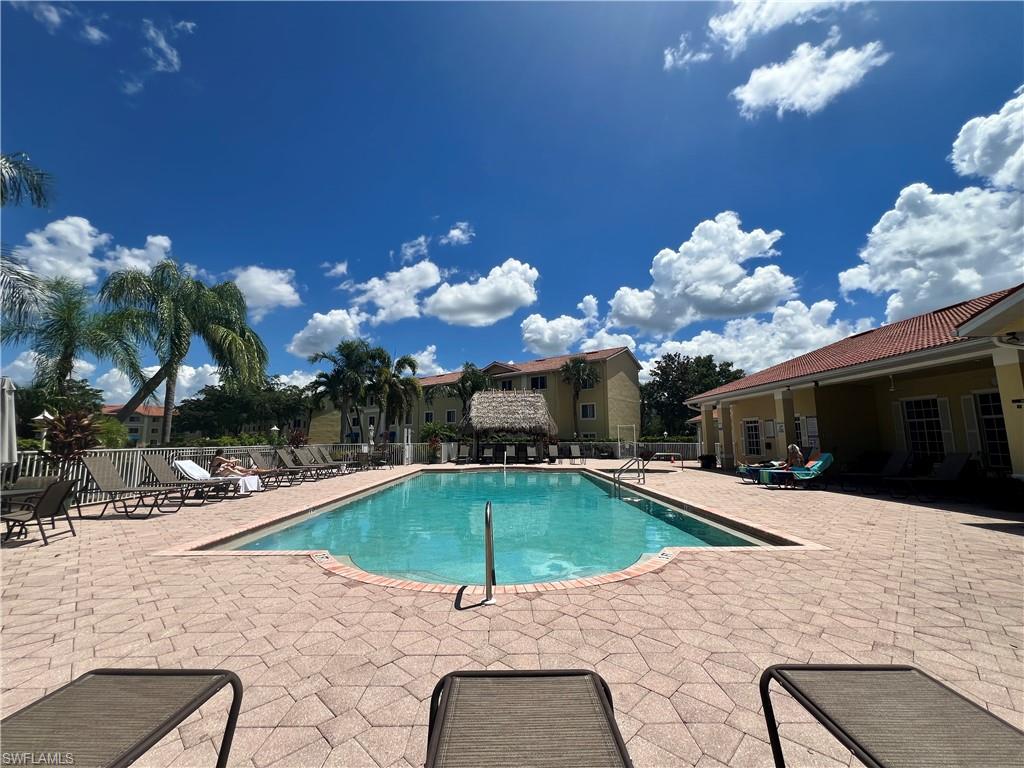 Community pool featuring a patio area