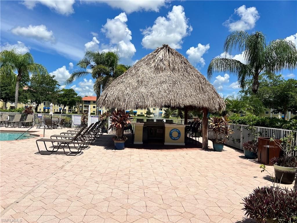 View of patio featuring a community pool