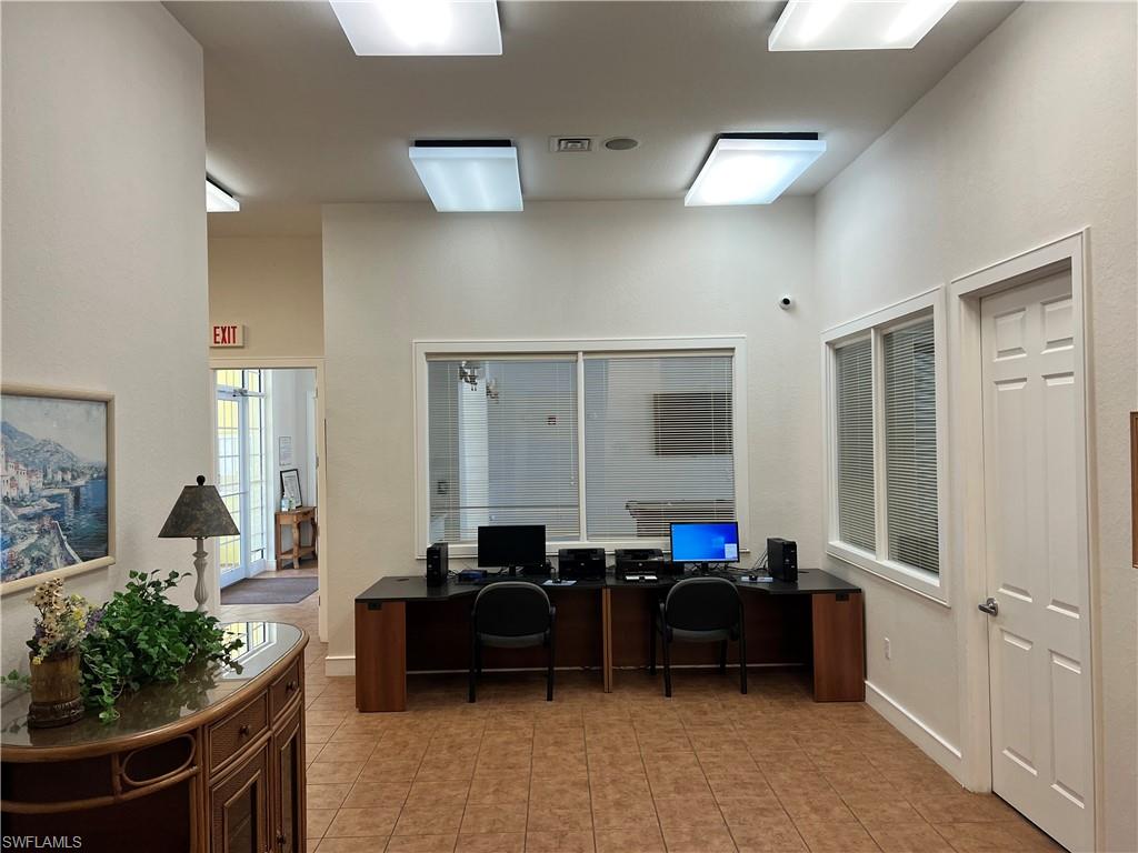 Home office featuring baseboards
