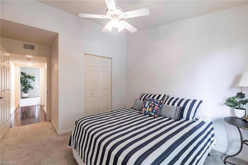 Bedroom featuring carpet flooring and a ceiling fan