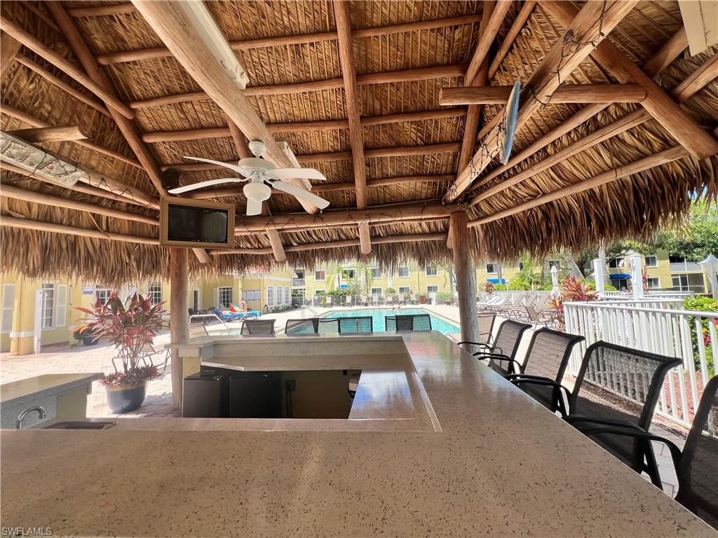 View of patio featuring ceiling fan
