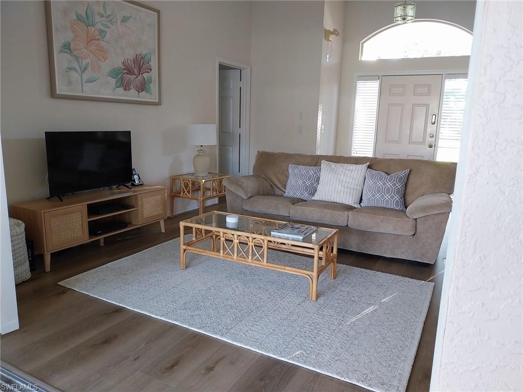 Living area featuring wood finished floors