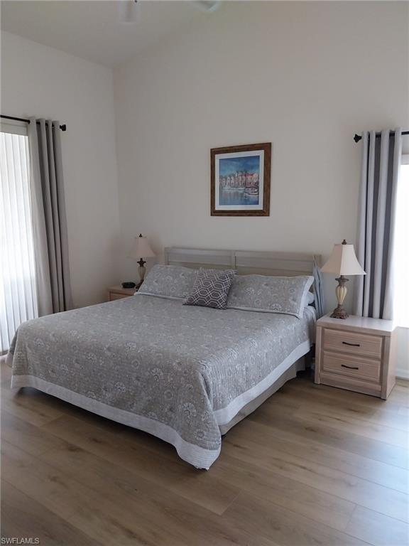 Bedroom with wood finished floors