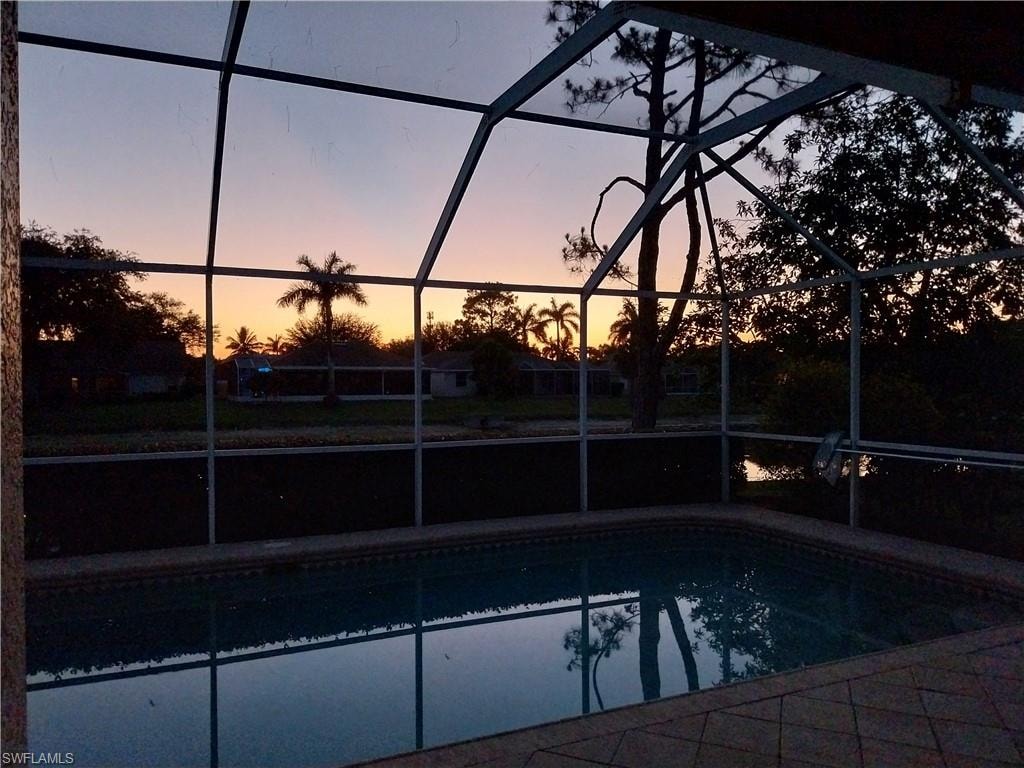 Outdoor pool with a lanai