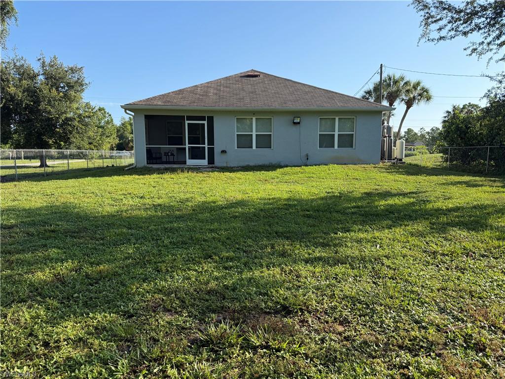 Expansive green lawn providing ample outdoor space