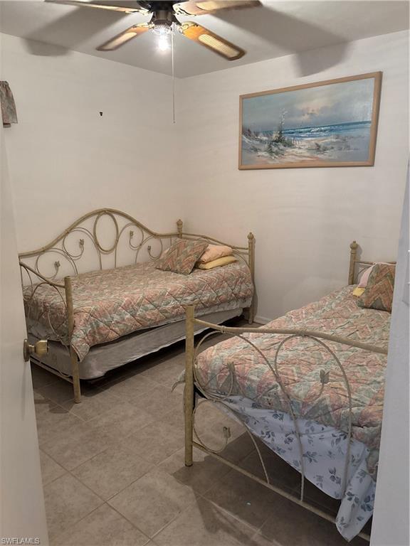 Front Bedroom with twin beds and walk in closet