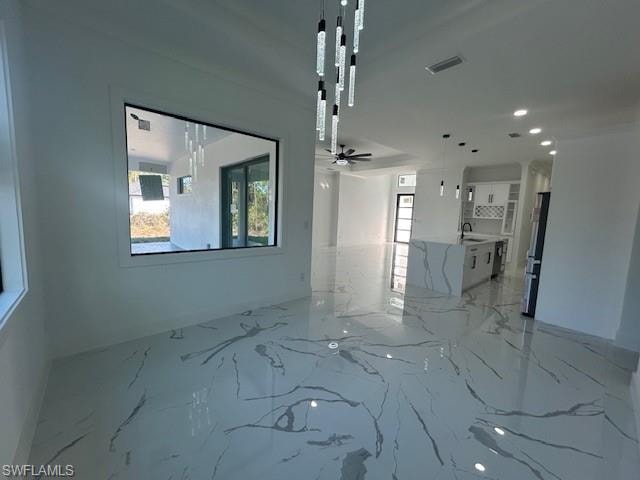 Unfurnished room with light marble finish flooring, recessed lighting, and a ceiling fan