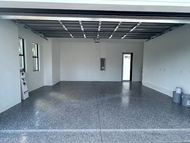 Garage featuring electric panel