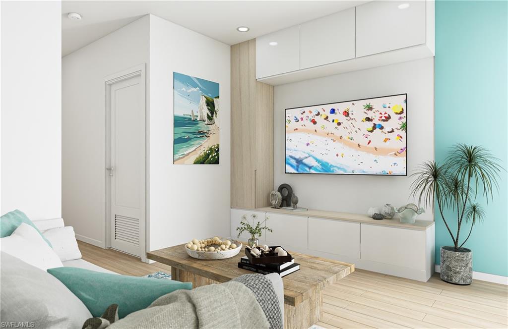 Sitting room featuring light wood-style floors and recessed lighting