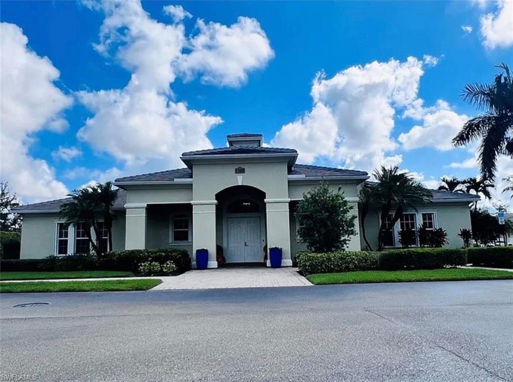 View of front of home with stucco siding