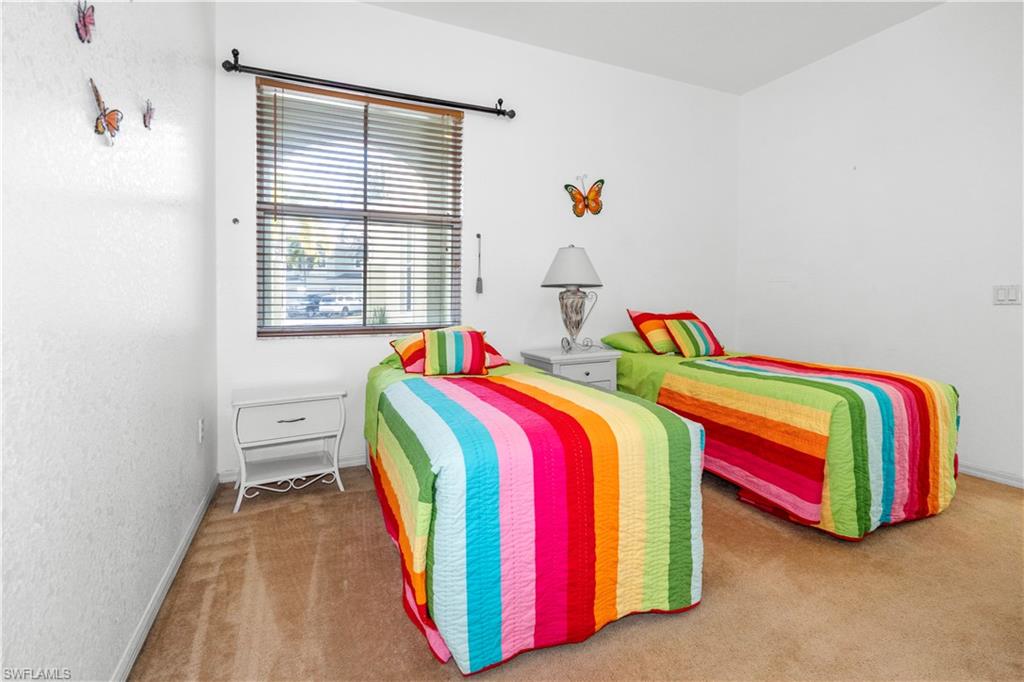 Bedroom featuring carpet floors