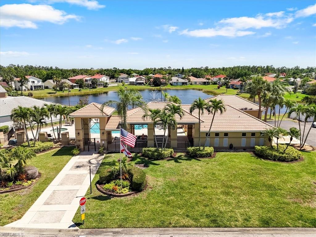 Drone / aerial view featuring a residential view and a water view