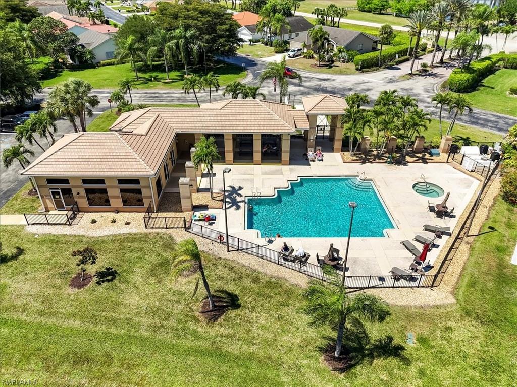Pool featuring fence and a patio