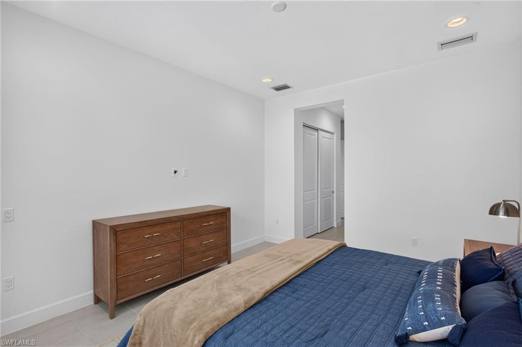 White-painted walls with recessed lighting