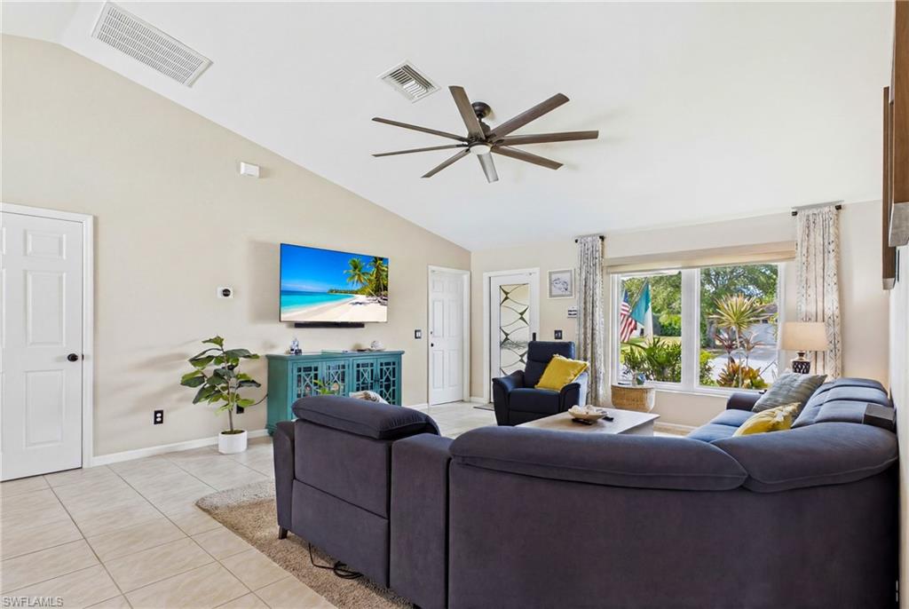 A custom front door is another charming part of the home and welcomes you into the open great room!