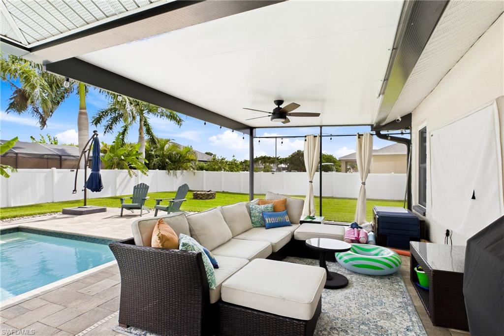 The outdoor lanai is a true extension of living space - it is currently set up with an outdoorliving area, dining area and multiple sun areas! Lots of shade and plenty of sun - the best of both worlds!