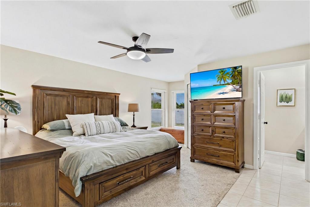 Master bedroom is split from the guest bedrooms and offers a nice size closet and more of that beautiful natural light!
