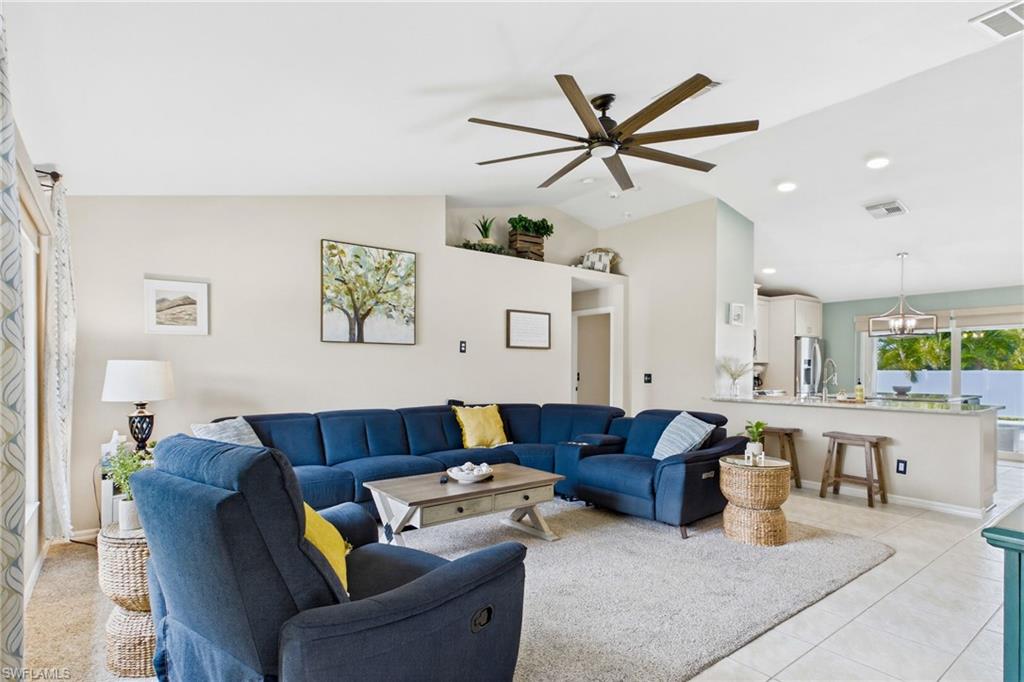 A serene and flowing floor plan with plenty of room for large furniture and open to the kitchen and dining area. This home would also make a great vacation rental!